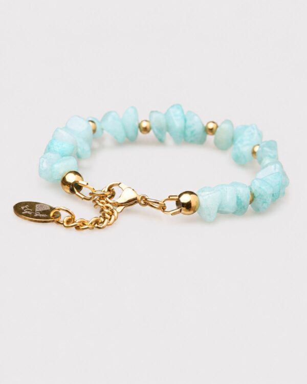 Light blue jade bracelet by The Gem Stories, showcasing high-quality jade stones and gold accents, meticulously handcrafted for a timeless look.