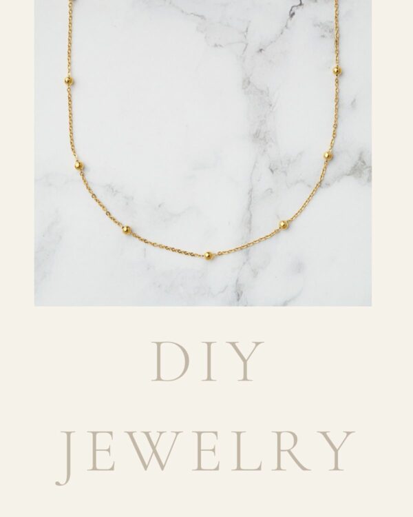 Long chain necklace with large 24k gold dots, showcasing a bold and luxurious design.