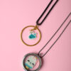 Miyuki hand-stitched summer elements on a Memory Locket and a 24k gold-plated circle base by The Gem Stories.