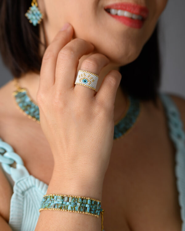Miyuki hand-stitched ring and bracelet by The Gem Stories, featuring intricate beadwork in turquoise and white.