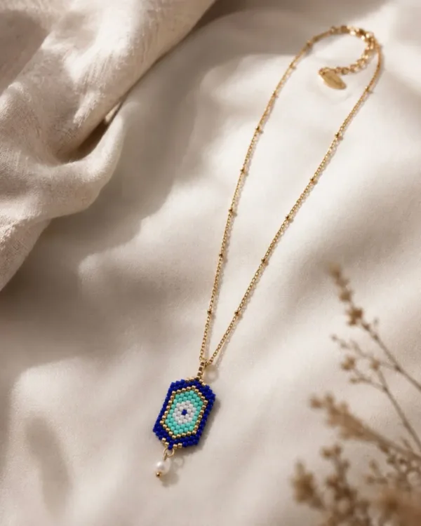The Gem Stories Miyuki Cuties Blue Eye Element featuring colorful Miyuki beads and a delicate evil eye design.