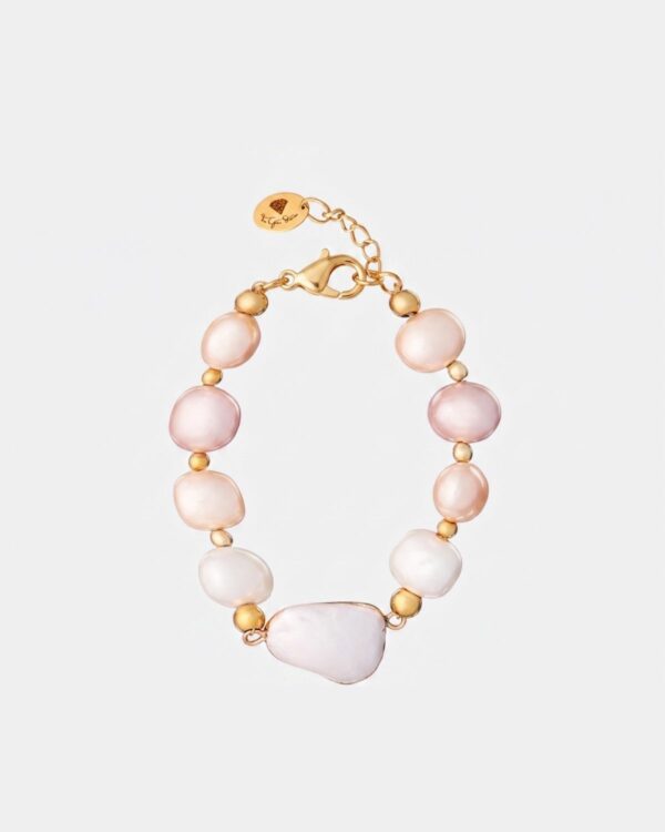 Handmade Mother of Pearl bracelet with irregular pink and white pearls and gold-plated beads.