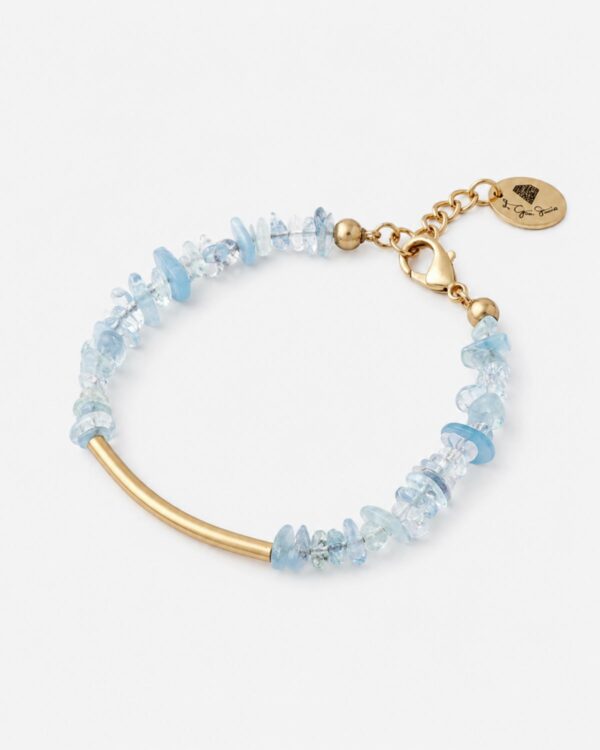 Handmade aquamarine bracelet with gold-plated curved element by The Gem Stories