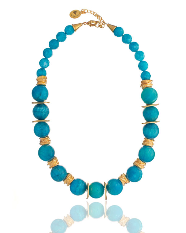 Sizeable light blue jade necklace with gold accents