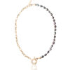 Gold necklace with alternating black pearls and chain links.