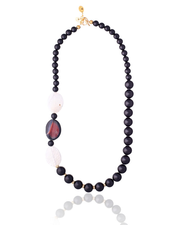 Black Onyx Necklace with white and red accent stones on a white background