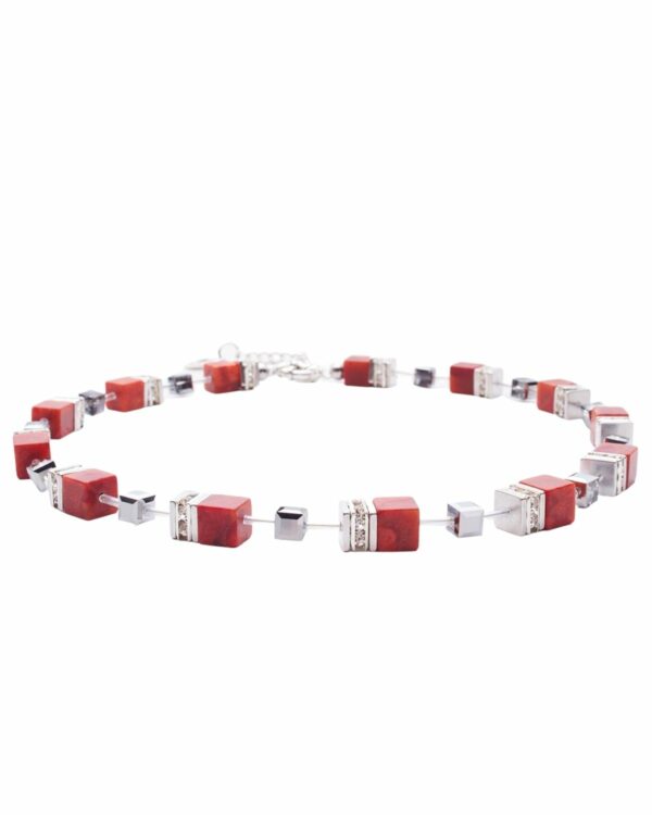 Tile Coral Necklace with red coral and silver accents on a white background