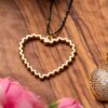 Holey Heart Necklace with Intricate Cut-Out Design