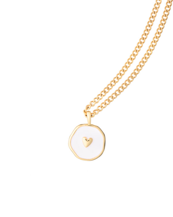 Gold Enamel Heart Necklace with a white pendant featuring a small gold heart