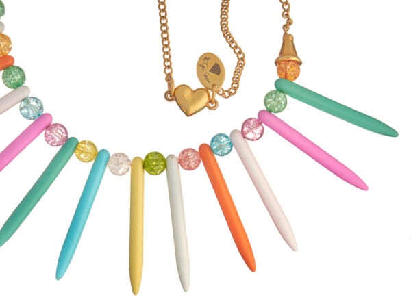 Multicolored howlite sticks necklace with assorted colorful beads and gold chain.