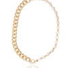 Elegant white pearls interspersed with delicate silver chains in a sophisticated necklace.
