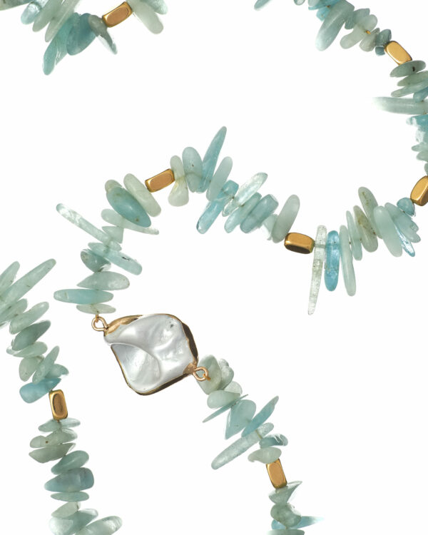 Handcrafted necklace featuring raw aquamarine chips.