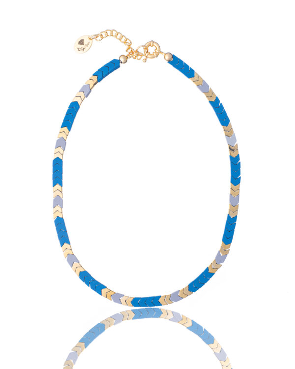 Cyan blue arrow-shaped hematite pendant on a chain necklace