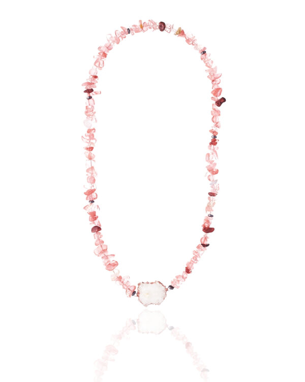 Tourmaline chip necklace with agate centerpiece on a white background