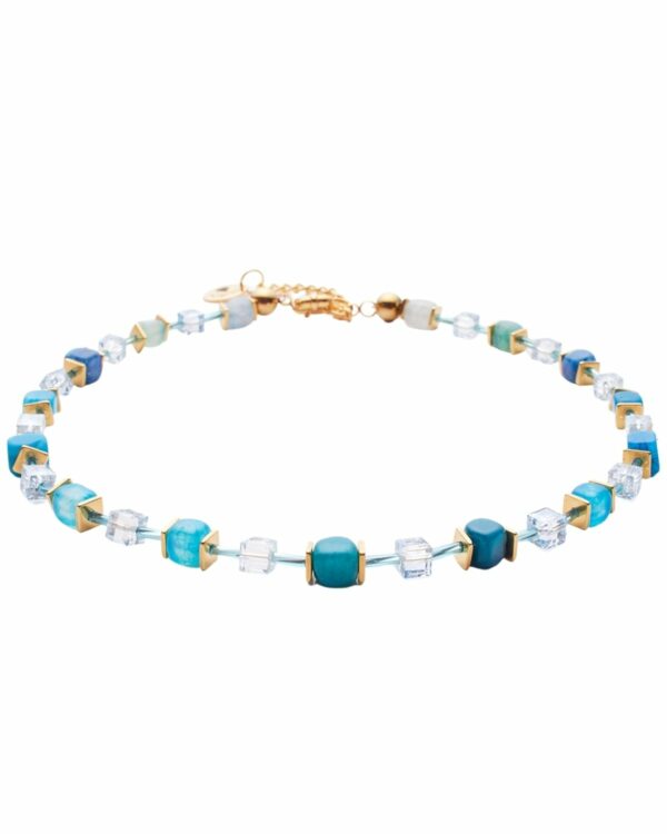 Light blue agate necklace with gold accents on a white background