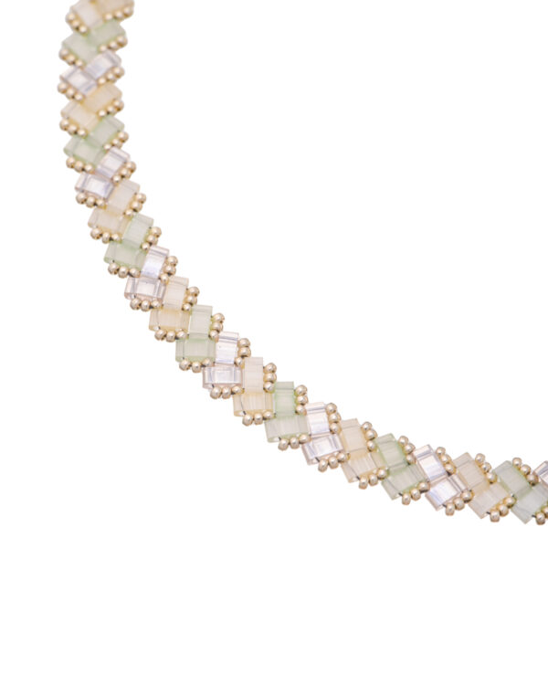 Woven Miyuki Side Tila necklace with pastel rainbow beads and silver clasp.