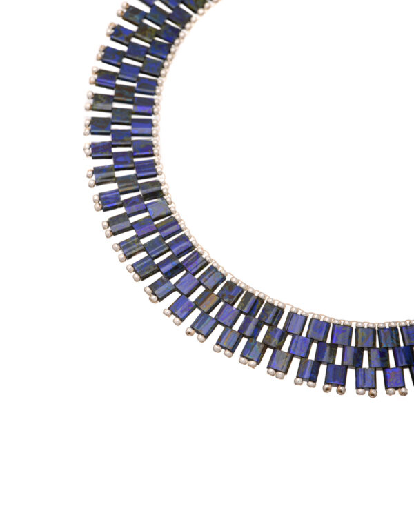Layered Miyuki necklace with lapis lazuli beads and a silver chain.