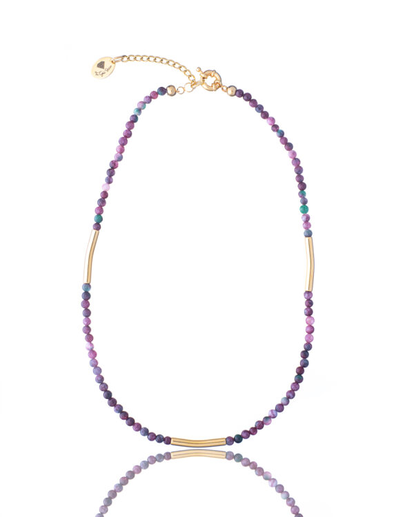Single-strand necklace with purple agate beads and gold accents