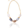 Nude Agate necklace with polished stones and gold chain accents.