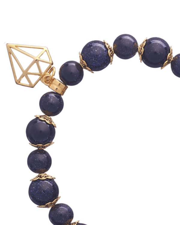 Blue Sand and Diamond Bracelet - Elegant jewelry piece with blue sandstone and diamond accents.