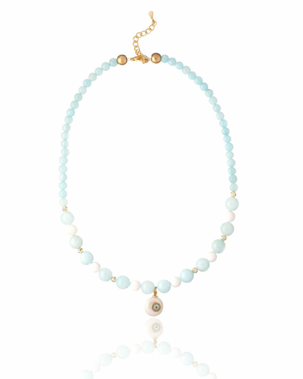 Elegant necklace with pastel blue jade, coral accents, and a protective eye charm.