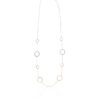 Long necklace with gold round shapes and delicate chain.