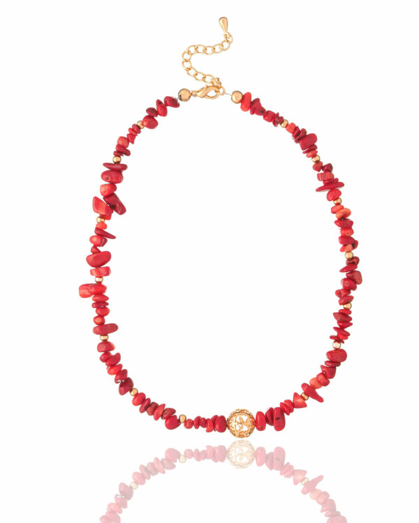 Striking red coral chips necklace featuring a detailed filigree centerpiece.