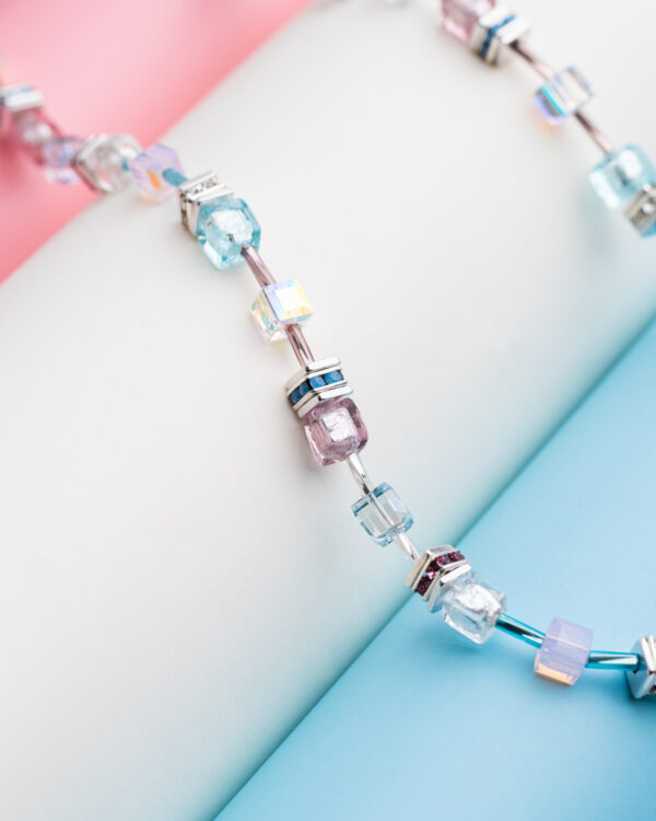 Close-up of a crystal necklace with multicolored Murano glass beads