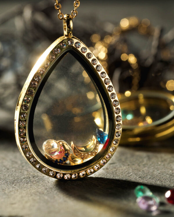 Elegant 24k gold plated teardrop floating memory locket with intricate charms