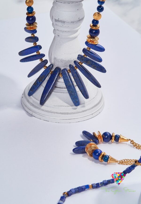 Lapis Lazuli Sticks Necklace and Matching Bracelet on Marble Stand