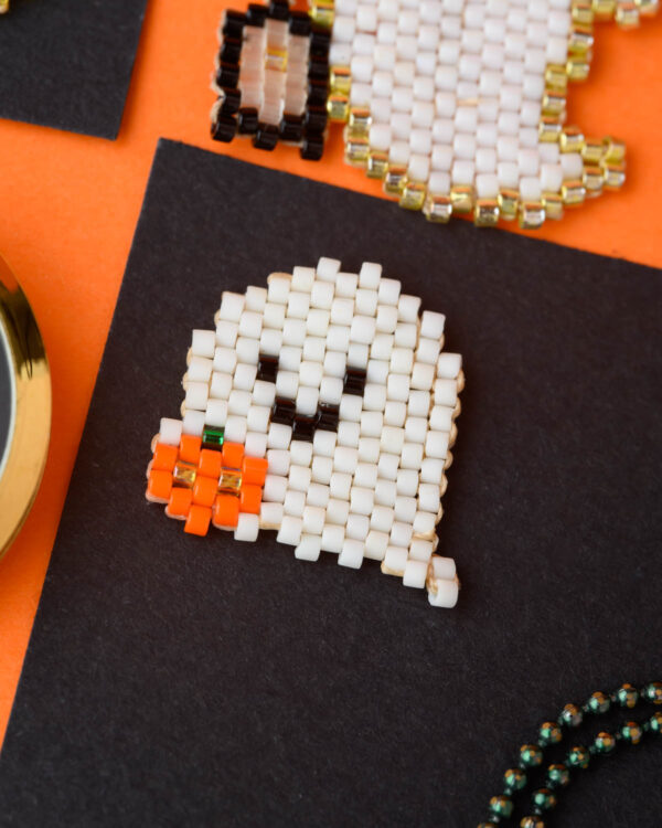 Miyuki Cuties Halloween Element Small Ghost pendant with white, black, and orange beads