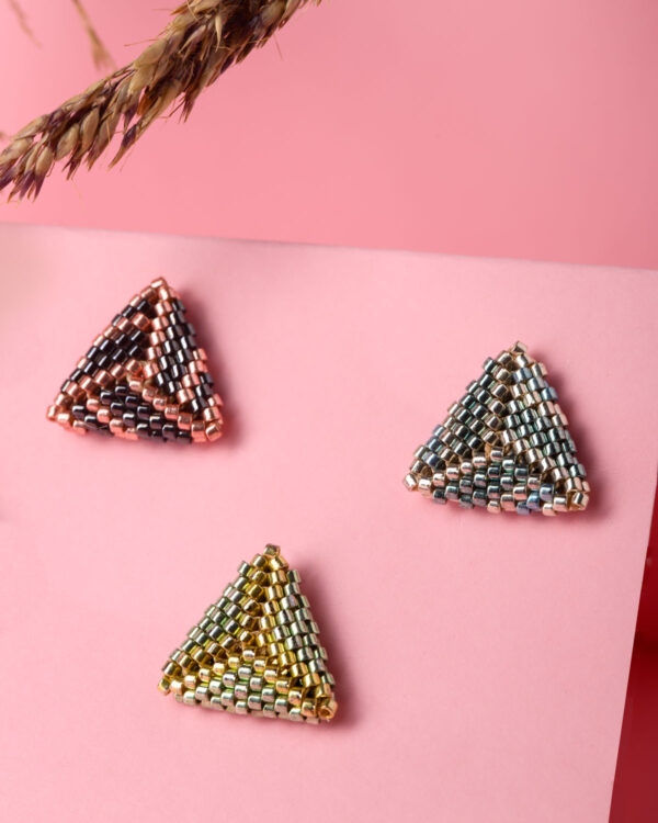 Three pairs of Miyuki triangle stud earrings in different colors