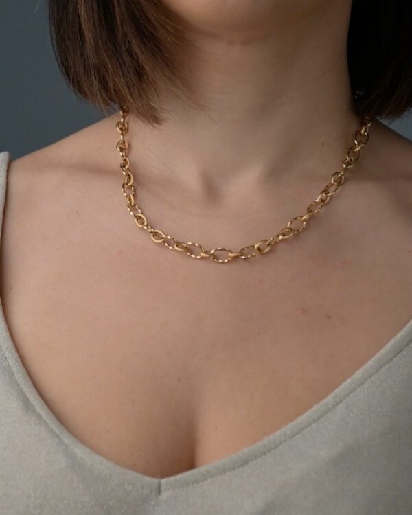 DIY necklace chain in gold with trefoil charm and hanging decorative charms