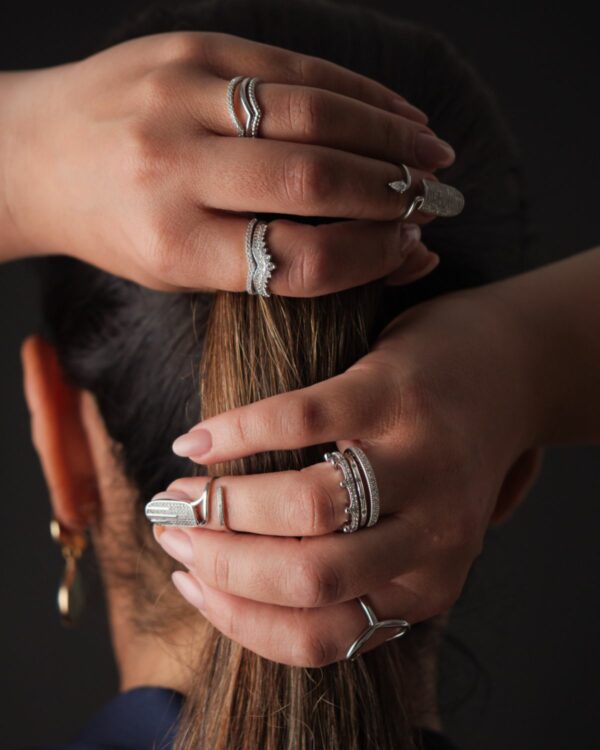 Elegant rhodium plated rings with sparkling gemstones