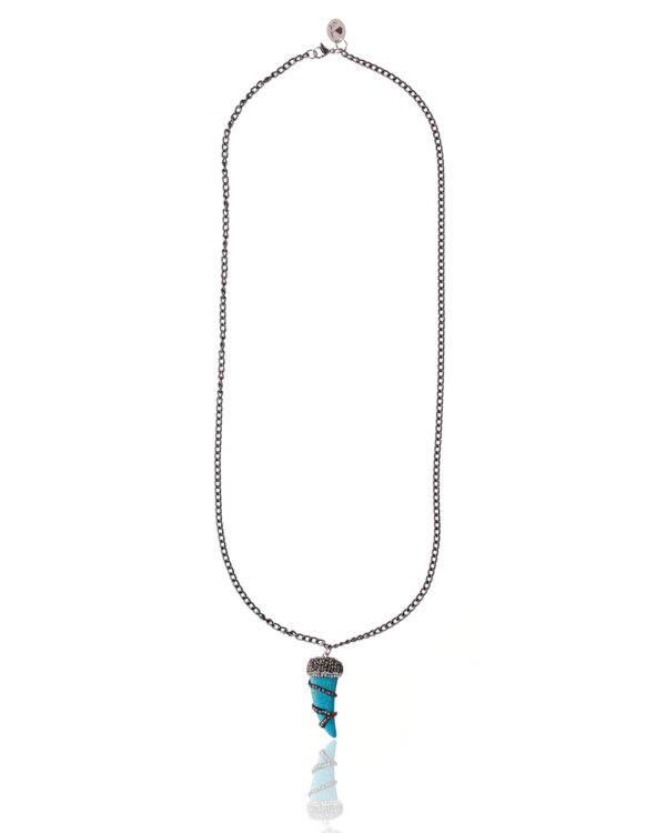 Long silver chain necklace with a blue howlite tooth pendant