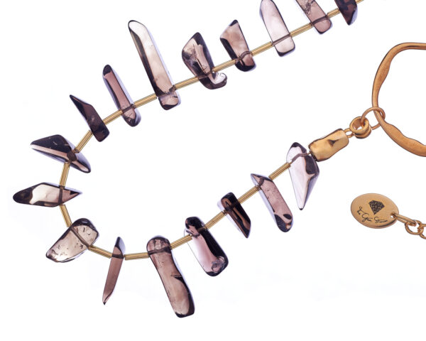 Refined necklace with pointed smoky quartz crystals draped gracefully.