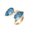 Elegant Aquamarine Ignite Ring with a blue gemstone on a silver band