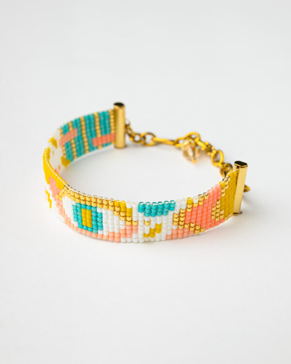 Miyuki Loom Bracelet with colorful eye pattern beads and gold clasp.