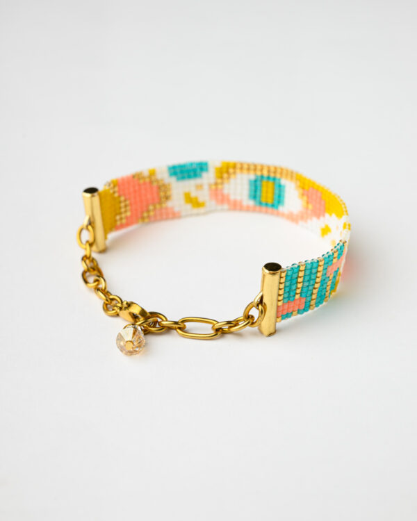 Colorful Miyuki bead bracelet with an eye design and gold-tone clasp.