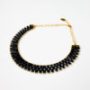 Elegant black Miyuki Tila bead necklace with gold accents by The Gem Stories.