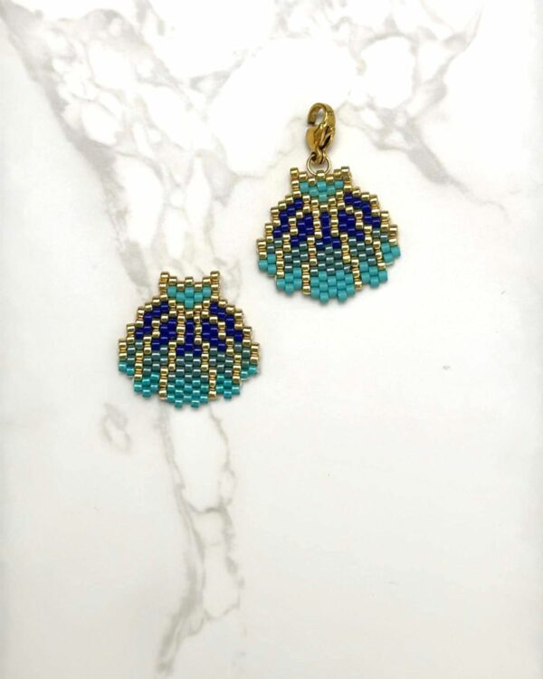 Miyuki beadwork shell pendants in blue, turquoise, and gold hues.