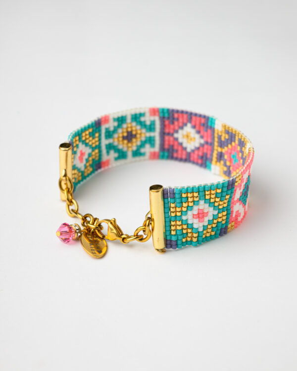 Handcrafted bracelet with colorful Miyuki beads and a gold-tone clasp.