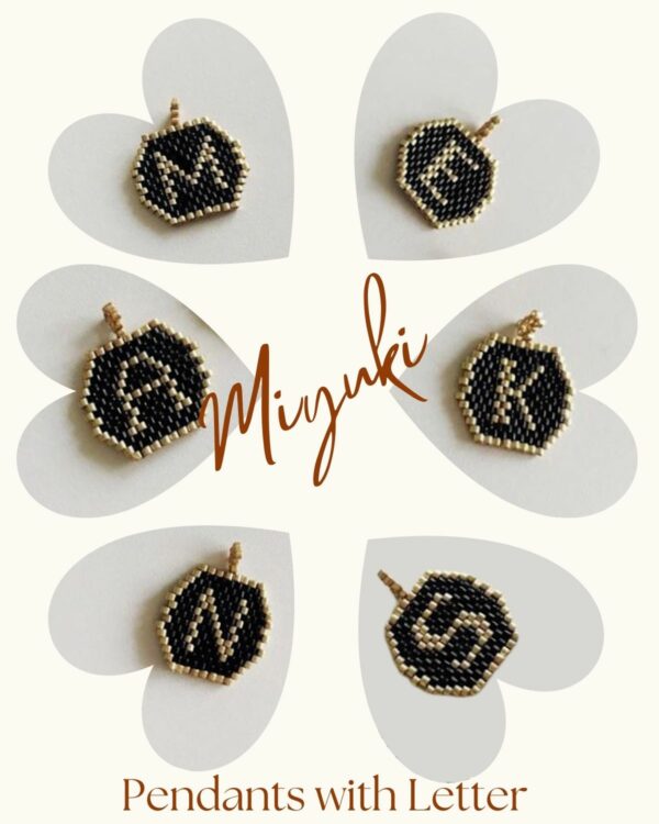 Handcrafted Miyuki initial letter pendants in black and gold displayed in a heart pattern.