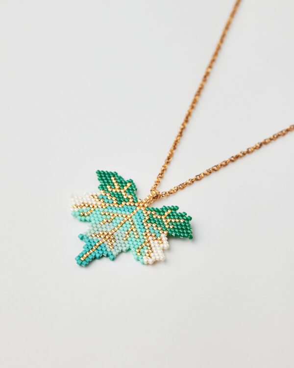 Handmade leaf necklace with Miyuki beads in green, turquoise, white, and gold.