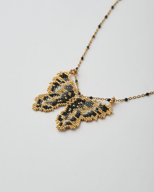 Miyuki Midnight Butterfly Necklace – delicate butterfly pendant with midnight blue accents