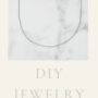 Long chain necklace with elegant rhodium-plated dots, showcasing a modern and sophisticated design.