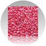 Red Miyuki triangle beads with rounded edges for jewelry making and beadwork designs.