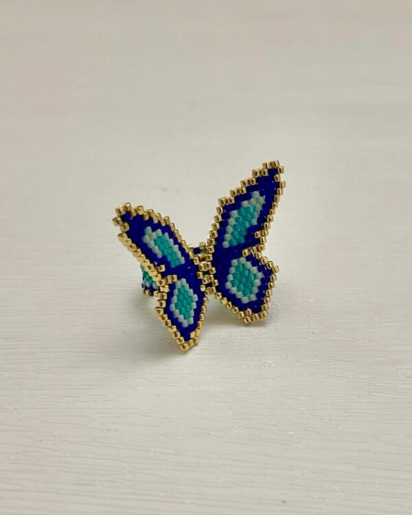 Handcrafted Miyuki butterfly ring with blue, green, and gold beads