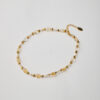 Full view of handmade citrine and pearl necklace with 24k gold plated details