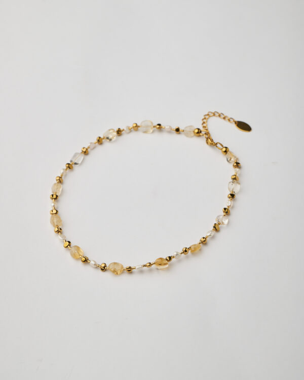 Full view of handmade citrine and pearl necklace with 24k gold plated details
